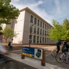 Arts Building at UC Davis with bicyclists riding by